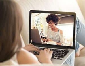 Virtual lactation consultant providing support via video call.