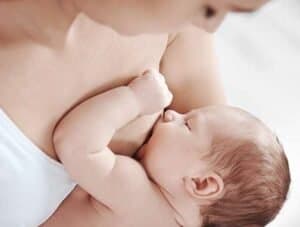 Lactating mother breastfeeding her baby, expert support in Philadelphia.